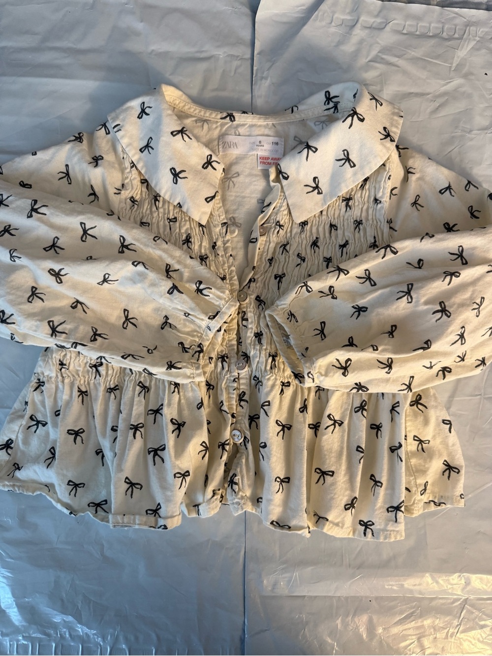 Zara Cream Blouse with Black Bow Print and Ruffle Hem